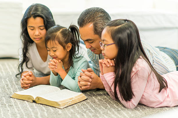 families praying together