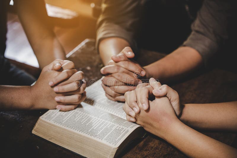 Group of people in prayer