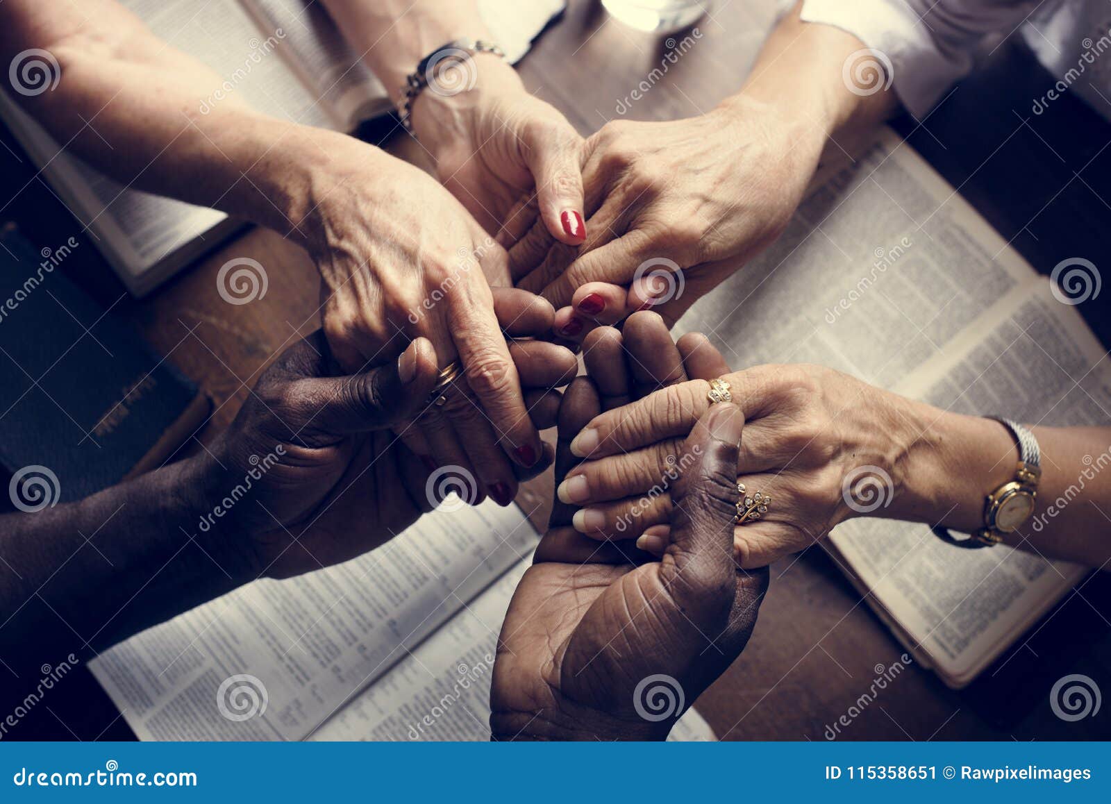 Holding hands in prayer