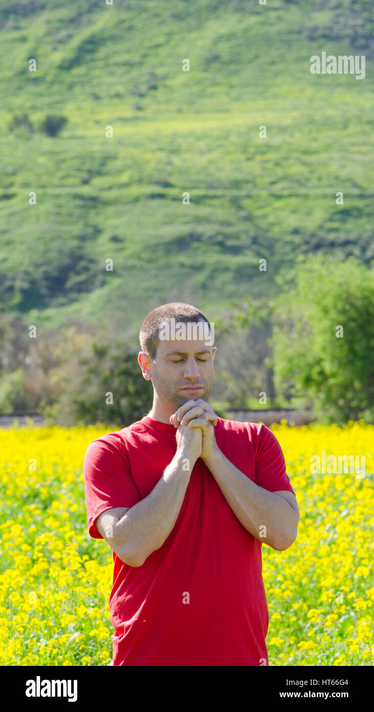 Person praying in solitude