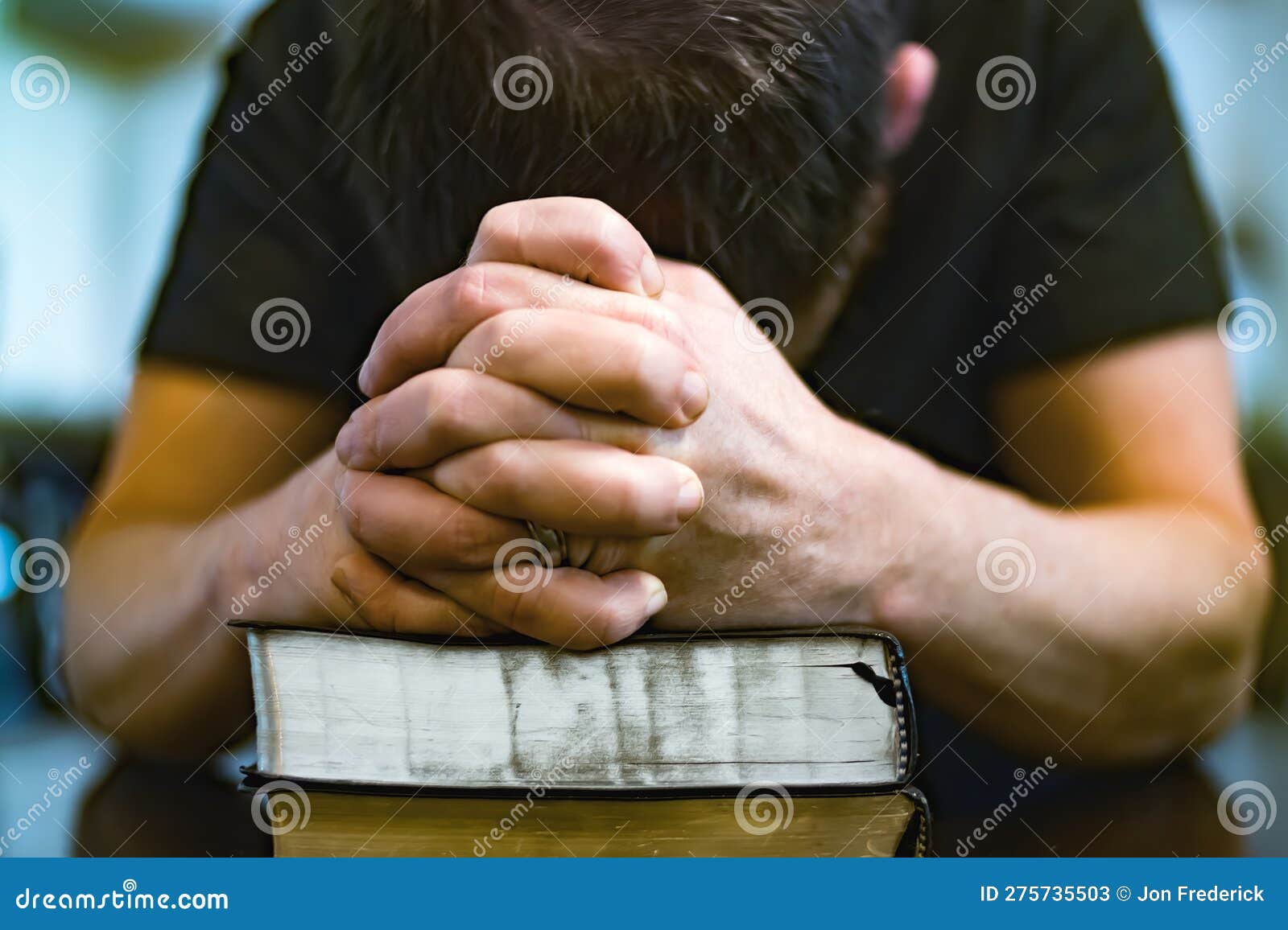 Man praying in solitude and humility